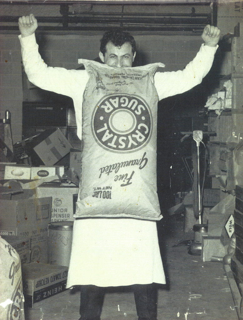 Sam-lifting-100lb-sugar-with-mouth